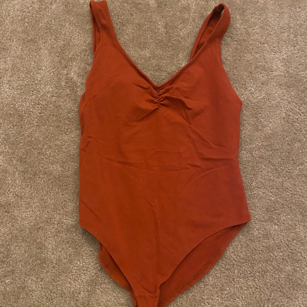 Rust/ burnt Orange body suit